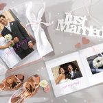 Ein Fotobuch als Geschenk: Ein selbst gestalteter Bildband bleibt dem Brautpaar als wertvolles Erinnerungsbuch.
