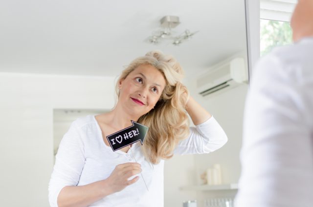 Woman loving her hair