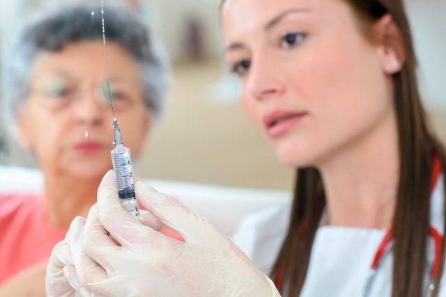 Doctor preparing an injection