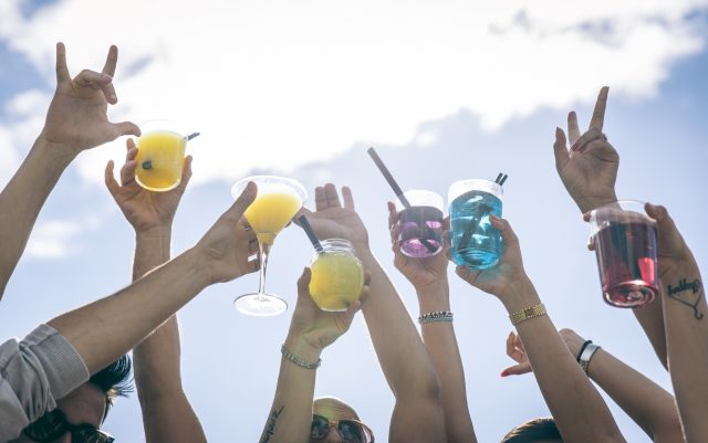 People making party and dancing on a beach party