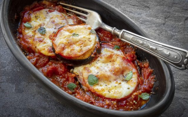 Baked Eggplant with Tomato and Mozzarella in Black Dish