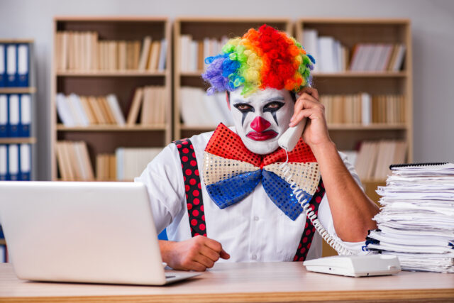 Clown businessman working in the office