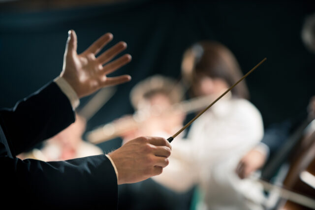 Orchestra conductor on stage