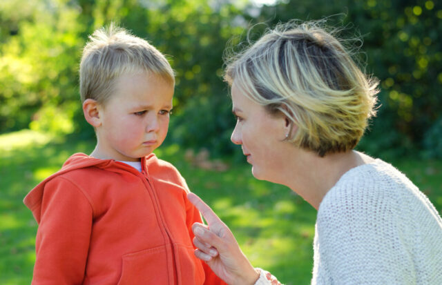 Mother scolds her son crying